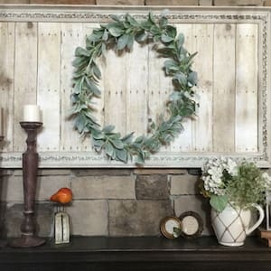 rustic farmhouse styled decor on fireplace mantel